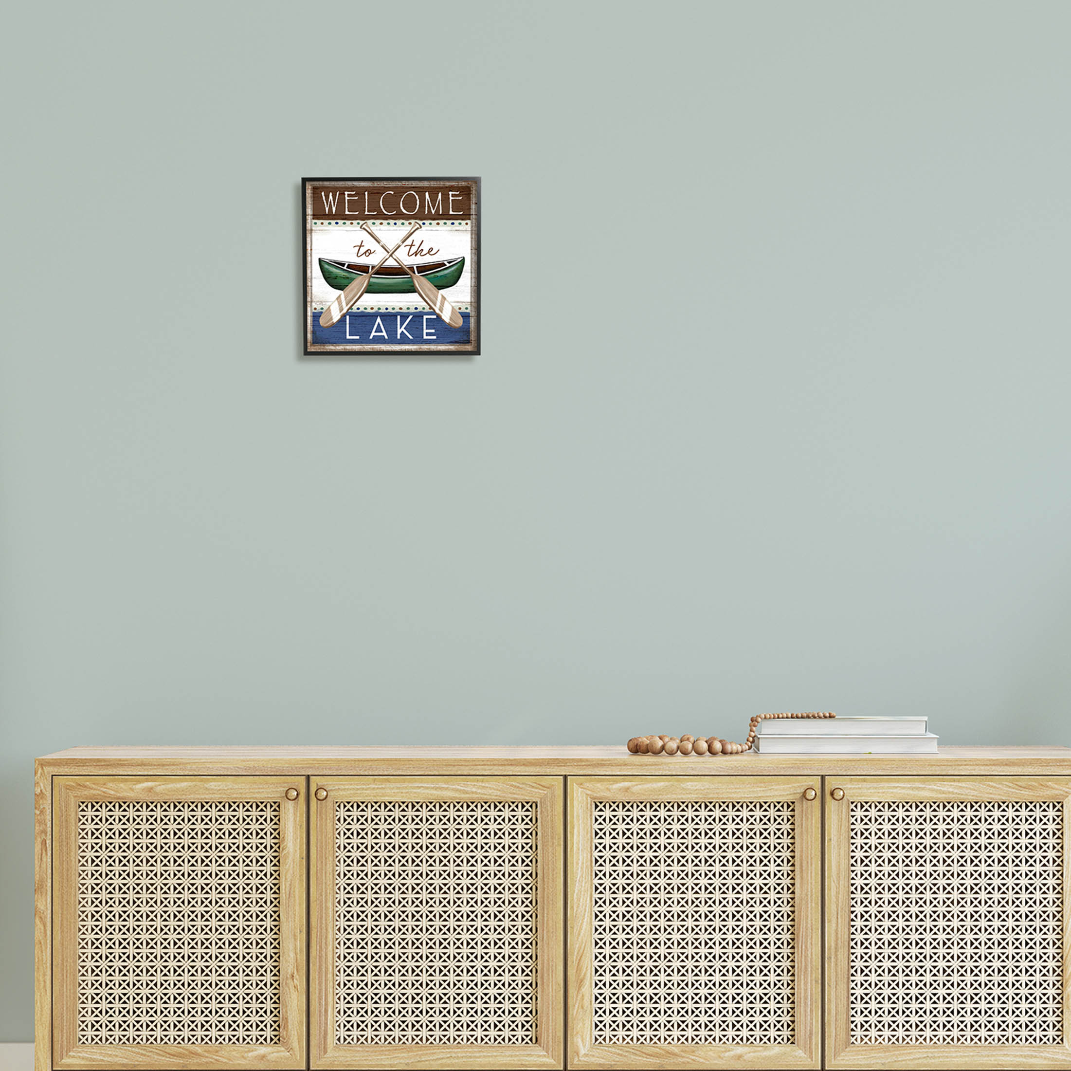 Stupell Industries Rustic Lake Welcome Canoe Sign Graphic Art Black Framed Art Print Wall Art, Design by Elizabeth Tyndall