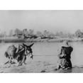 thumbnail image 2 of Mexican Man Leads A Loaded Donkey Crossing The Rio Grande At Ojinaga History (36 x 24), 2 of 2