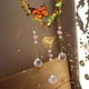 thumbnail image 1 of Campanas De Viento Campanillas de viento de cristal Mariposa Estrella Luna Amor Prismas Colector de luz Adornos para el hogar Sywqhk Libre de BPA, 1 of 9