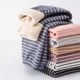 thumbnail image 3 of 2024 Otoño/Invierno niños forro polar capa Base gruesa pantalones cálidos niños niñas pantalones de casa a rayas ropa de dormir para mediados a grandes Ch, 3 of 5