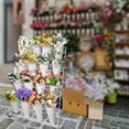 thumbnail image 6 of POWKOL 4 Layers Wrought Iron Plant Shelf with 4 Wheels, Movable Flower Display Stand with 16 Round Buckets, Heavy Duty Florist Bouquet Rack for Patio, Garden, Fresh Flower Shop.(White), 6 of 8