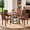 Walnut table+Four Brown Chairs (Walnut legs), variant on Hi loPres Round Dining Table Set for 4, 47.3-Inch Walnut MDF Desk with Black Hourglass Base, Brown Tufted Fabric Chairs in Apartment Kitchen