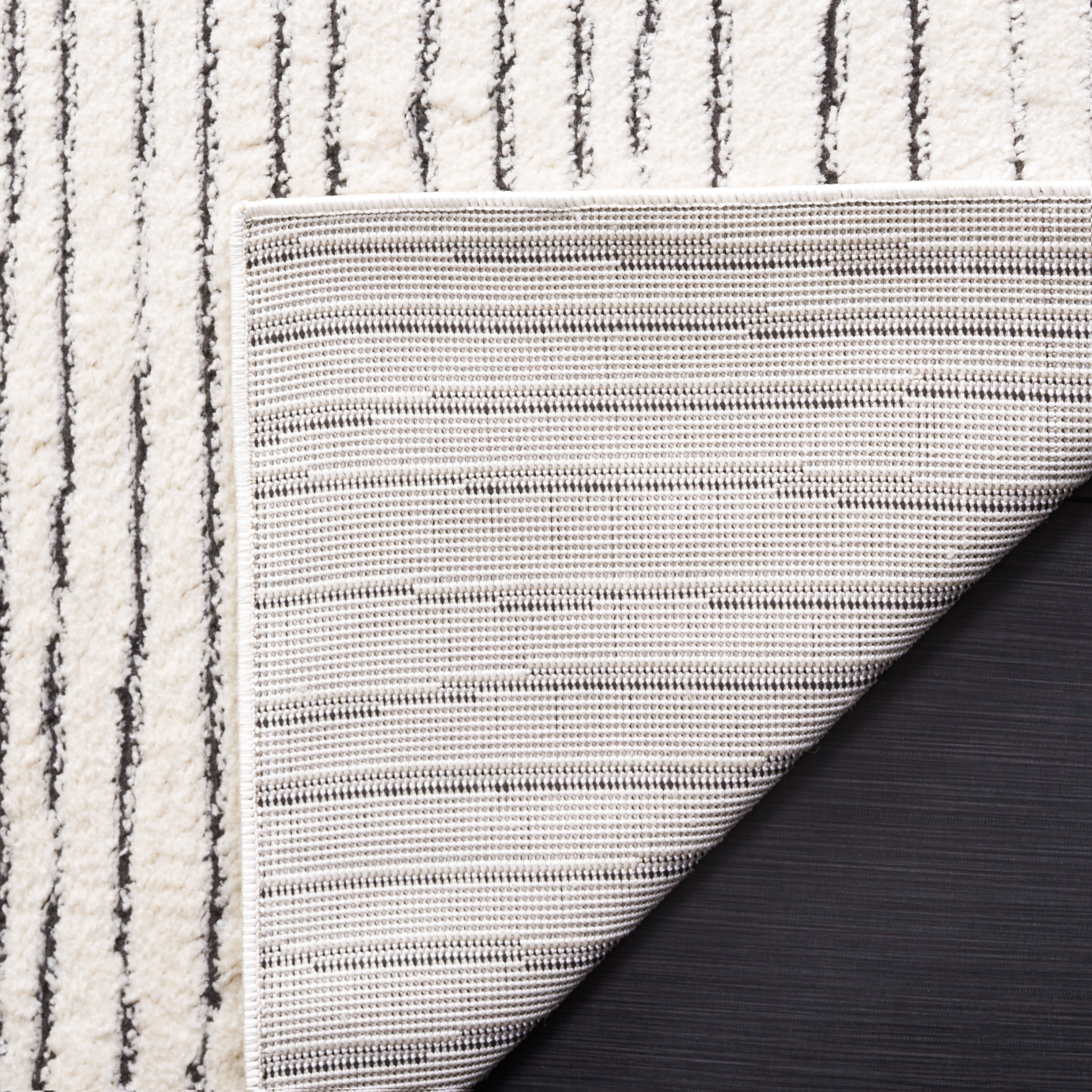 SAFAVIEH Melody Leo Abstract Polyester Runner Rug, Ivory/Black, 2'2" x 12'