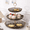 Grey, variant on Elegant Three-Tier Plastic Cake Stand with Gold-Rimmed Wave Design, Perfect for Displaying Desserts, Wedding Cakes, Birthday Celebrations, and Serving Cupcakes, Fruits, and Bread