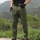 thumbnail image 1 of Pantalones largos para hombre, cintura elástica, informales, deportivos, multibolsillos, de poliéster., 1 of 3