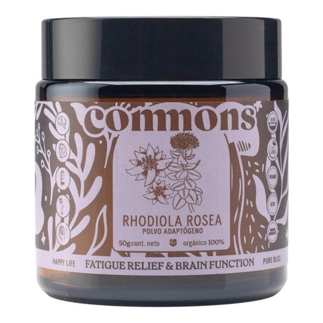 rhodiola rosea adaptógeno 50g commons polvo 100% orgánico frasco ámbar con tapa negra, vista frontal; etiqueta lila con ilustración botánica y texto 'RHODIOLA ROSEA POLVO ADAPTÓGENO' y '50g cont. neto', sello USDA Organic. A menudo se usa como adición a tés o smoothies.