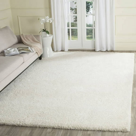 SAFAVIEH Ultimate Atanas Solid Plush Polyester Shag Area Rug, Ivory, 8' x 10'