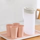 thumbnail image 5 of Botella de agua de plástico transparente con asa | Capacidad de 1 litro para café helado, té y bebidas frías | Jarra reutilizable sin BPA para el hogar, la oficina y bebidas de verano, 5 of 6