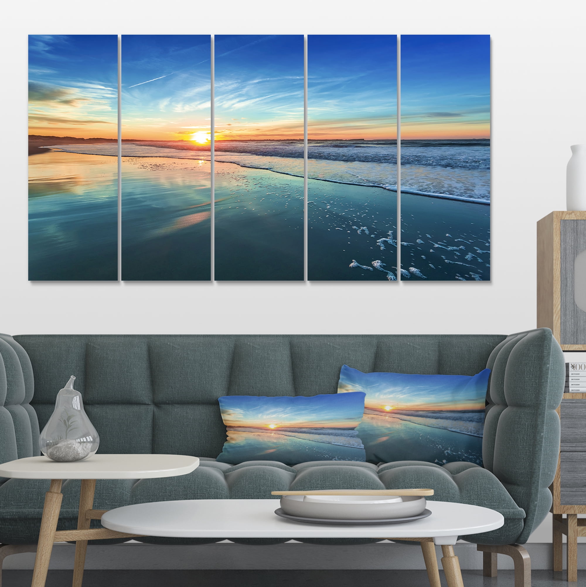 Designart 'Blue Seashore with Distant Sunset ' Seascape Canvas Art Print