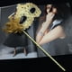 thumbnail image 3 of Máscara de Halloween con exquisito patrón de dragón de encaje, tela de cuero, plumas laterales, bola de flores, máscara de mano, 3 of 4