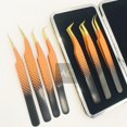 thumbnail image 1 of Juego de pinzas de doble tono con punta dorada, pinzas profesionales para pestañas con agarre de diamante de acero inoxidable sólido al por mayor, 1 of 3