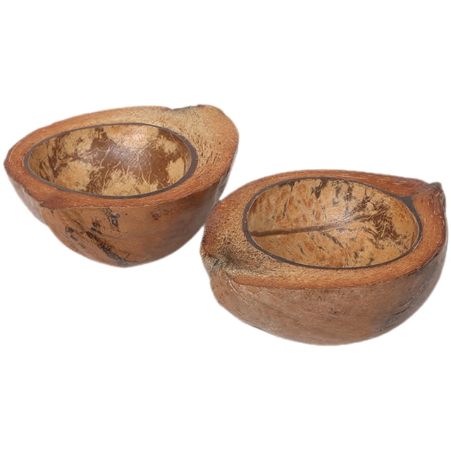 2 portavelas de cáscara de coco para hacer velas.