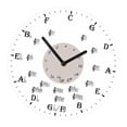 thumbnail image 1 of Reloj de pared con notas musicales, decoración de pared silenciosa, reloj redondo de regalo moderno para 30 centímetros, 1 of 9