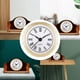 thumbnail image 4 of Reloj de pared de cuarzo redondo con mecanismo de inserción y bisel, batería y números romanos. Dorado, 4 of 9