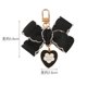 thumbnail image 3 of LLavero de amor negro Retro para mujer y niña, colgante nacarado con lazo, funda para auriculares, adorno, llaveros, regalo para pareja, 3 of 4