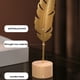 thumbnail image 4 of Escultura de plumas escandinava | Elegante decoración de plumas de metal con base de madera | Adorno de hogar moderno y liviano para sala de estar, dormitorio, oficina | Oro | 4,5 x 19,5 cm | Idea, 4 of 6