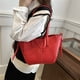 thumbnail image 4 of Bolso de mano de piel PU, bolso tote de gran capacidad, diseño de moda con alas, bolso de hombro único y de alta gama., 4 of 10