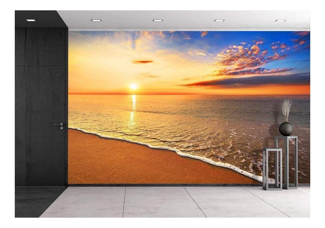 Wall26 Beautiful tropical sunrise on the beach. Removable Wall Mural