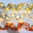 thumbnail image 2 of LED Ribbon Christmas Lights,Christmas Decoration Led Ribbon Lights Christmas Tree Ornaments DIY Lace Bow String Lights Decoration,for Xmas Party Indoor Outdoor Hanging, 2 of 7