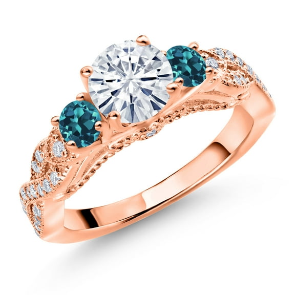 Gem Stone King 18K Rose Gold Plated Silver White Moissanite and London Blue Topaz Engagement Ring for Women (1.33 Cttw, Gemstone, Round 6MM and 3MM, Size 9)