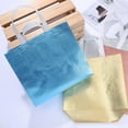thumbnail image 6 of ROSENICE 8Pcs Golden present Bags for Christmas Shiny Rectangular Non-woven Fabric Birthday Goodie Bags, 6 of 8