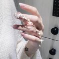 thumbnail image 1 of Pulsera larga HUOGUO de uñas postizas con forma de estrella lunar, color nude, 24 unidades, 1 of 4