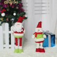 thumbnail image 4 of Adorno navideño con forma de mono, pascuero, patas largas, retráctiles, 4 of 5