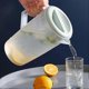 thumbnail image 2 of Plastic Water Jug With Lid Fridge Door Juice Jug Pitcher Container For Party 0.66 Gallon/2, 2 of 5
