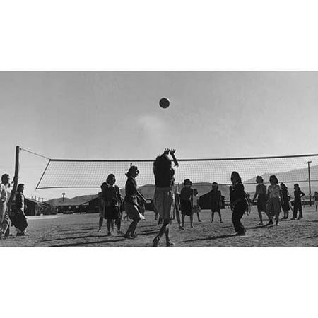 young women playing volleyball buildings in background  Ansel Easton Adams was an American photographer best known for his black-and-white photographs of the American West  During part of his career
