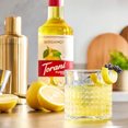 thumbnail image 2 of Torani Puremade Sirop de Bergamote – Zeste d'Agrumes Insaisissable et Notes Botaniques Élégantes d'Earl Grey, Bouteille en Verre de 750 ml (25,36 oz) – Emballage en Vrac Professionnel 12/caisse, 2 of 4