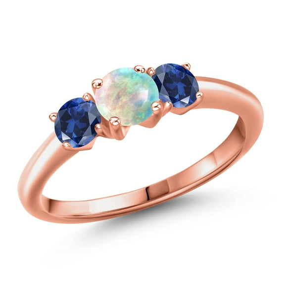 Gem Stone King 18K Rose Gold Plated Silver Simulated White Opal and Blue Created Sapphire Engagement Ring for Women | 1.00 Cttw | Round Cabochon 5MM | Gemstone October Birthstone | Size 6