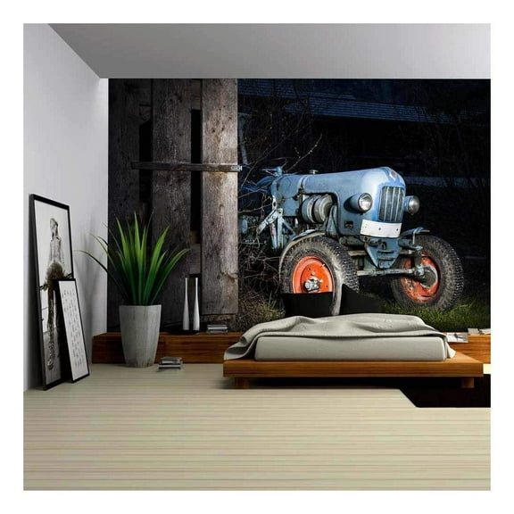 wall26 - Blue Oldtimer Farming Tractor Standing Next to a Wooden Hut at Night with Red Painted Tires - Removable Wall Mural | Self-Adhesive Large Wallpaper - 66x96 inches
