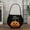 A, variant on JOGZMZ Halloween Candy Bag - 10" Pumpkin Trick or Treat Basket for Kids, Reusable Non-Woven Party Favor with Velvet Lined, Gift & Treat Bags for Halloween Decorations (Orange)