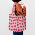 thumbnail image 4 of Xecao's Hand Drawn Strawberry Canvas Tote Bag is a versatile choice for women, serving as a stylish beach bag, shopping bag,and reusable grocery bag., 4 of 5