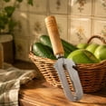 thumbnail image 1 of Pelador de cabeza redonda seguro y ergonómico con mango para pelar verduras,ideal para patatas,zanahorias y manzanas.Pelador compacto y portátil., 1 of 5