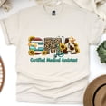 thumbnail image 1 of Cute CMA T-Shirt | Medical Assistant Appreciation Top with Sunflowers, Natural, Size L, 1 of 6
