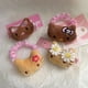 thumbnail image 4 of Nuevo y lindo tocado de Sanrio con diseño de Hello Kitty, bikini de piel negra, adornos para niña, tocado de anime kawaii, horquilla, accesorios para el cabello, 4 of 5