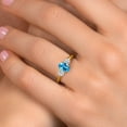thumbnail image 4 of Gem Stone King 10K Yellow Gold Swiss Blue Topaz and Lab Grown Diamond Engagement Ring for Women | 1.34 Cttw | Oval 7X5MM | Gemstone November Birthstone | Size 9, 4 of 6