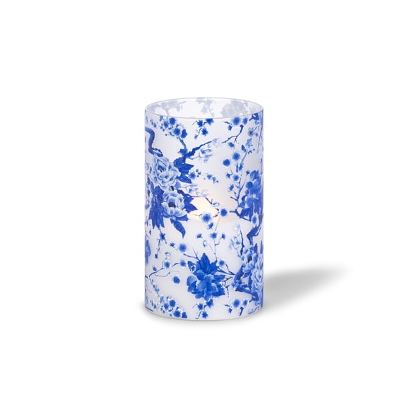 LED 3.5"D X 6"H Hand-Poured Wax Candle w/ Blue Floral Design. Next Gen LED Flame Patented Technology w/ Adjustable Brightness Control. 2 C Batteries (Not Included). Multi Timer Function, 4, 6 & 8 hr