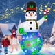 thumbnail image 1 of Muñeco de nieve inflable navideño de 7 pies con música y luces giratorias, 1 of 7