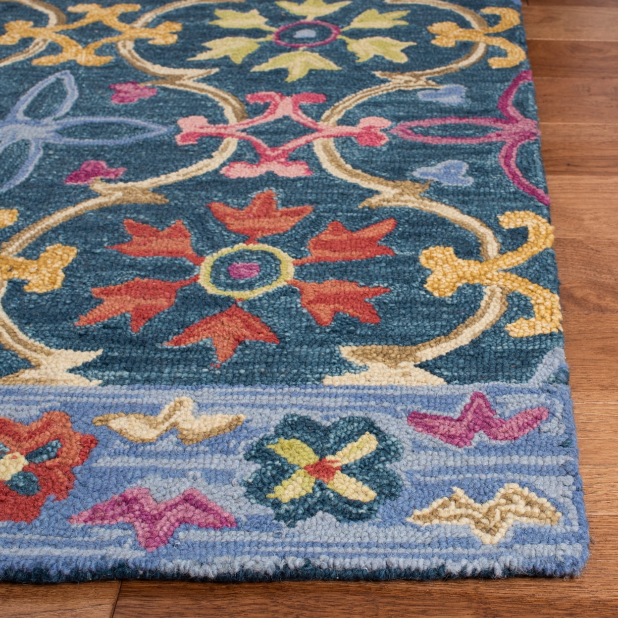 SAFAVIEH Suzani Ethelinda Geometric Swirls Wool Area Rug, Blue/Multi, 5' x 8'