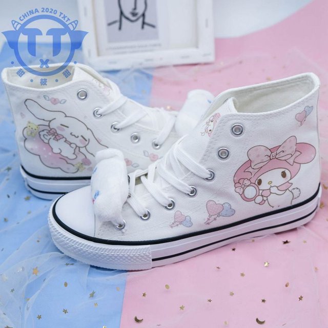 2024 zapatos blancos de verano y otoño nuevo estilo jade canela perro zapatos de lona de caña alta para niñas y niñas corazón ins graffiti versión coreana tendencia versátil
