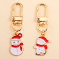 thumbnail image 1 of Llavero con colgante de muñeco de nieve y árbol de Navidad, joyería hecha a mano, regalos para mujeres y hombres, llavero de bolso, llave de coche, accesorios, 1 of 4