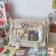 thumbnail image 1 of Get Ready for Campus with our Large Capacity Canvas Crossbody Bag - Fashionable and Spacious Shoulder Purse with Bag Charm, 1 of 4