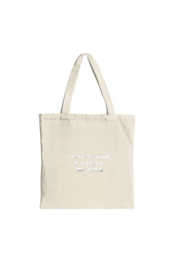 Light beige canvas tote bag with two handles featuring a unique white printed phrase for a stylish multifunctional accessory perfect for shopping and travel