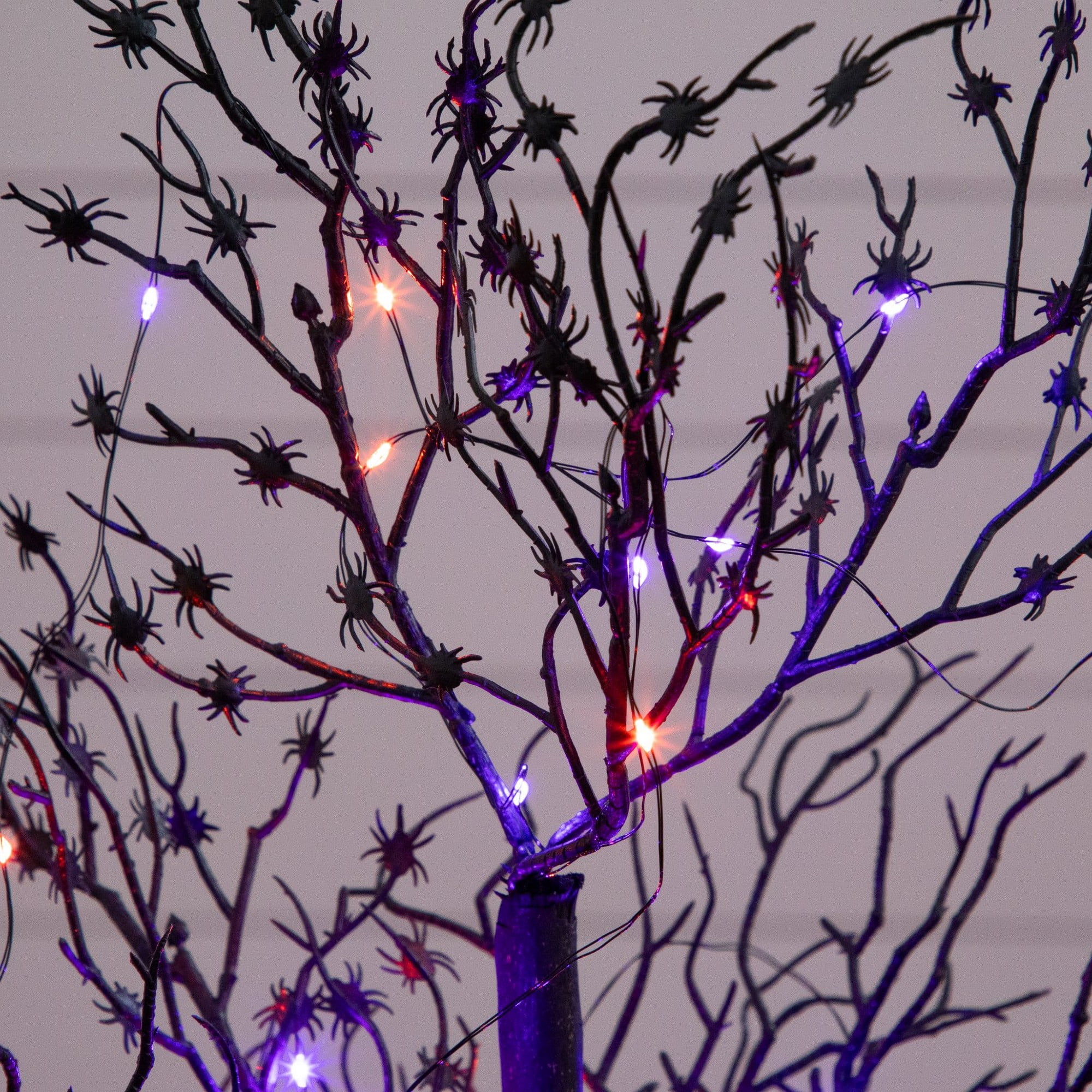 3ft. Pre-Lit Artificial Halloween Spider Twig Tree with 80 Orange & Purple LED Lights