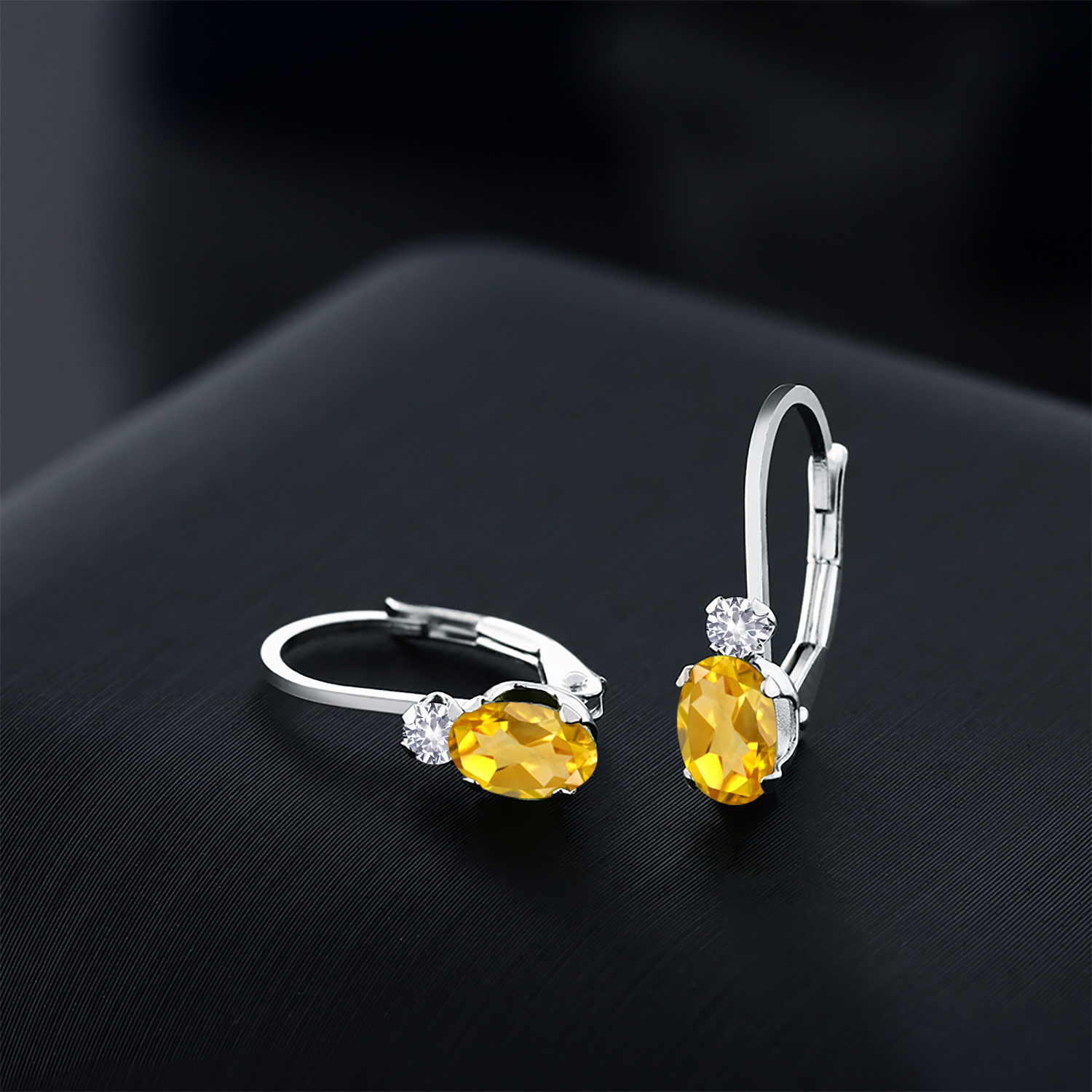 Gem Stone King 925 Sterling Silver Yellow Citrine and White Created Sapphire Leverback Earrings for Women (0.88 Cttw, Gemstone November Birthstone, Oval 6X4MM, Round 2MM, 3/4 inch)