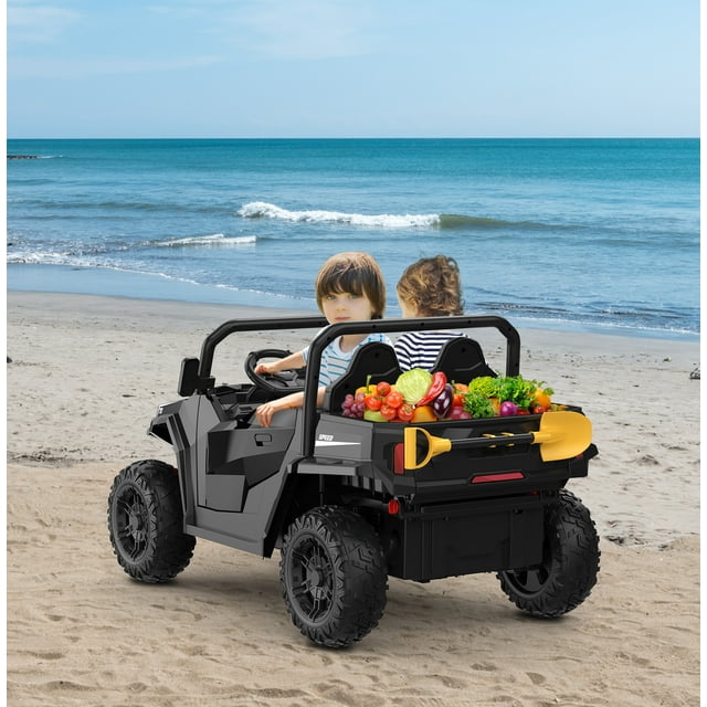 BeesClover 24V Electric Ride on Dump Truck for Kids, 2-Seater 4WD Remote Control Car with Electric Dump Bed & Shovel, LED Lights, Music Player, Max Speed 5Mph