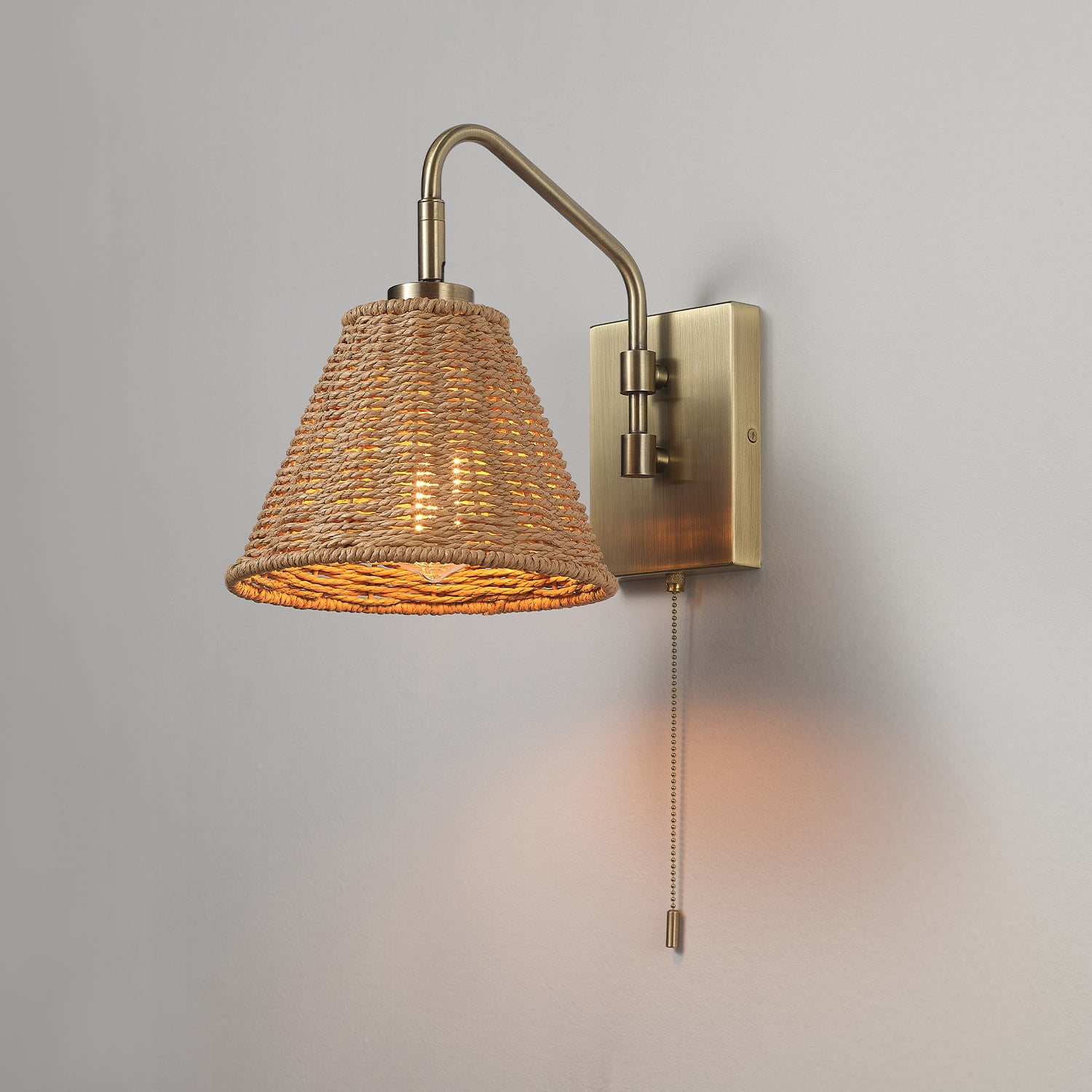 Novogratz x Globe Electric 1-Light Matte Brass Rattan Indoor Wall Sconce with Pull Chain Switch, No Battery Required