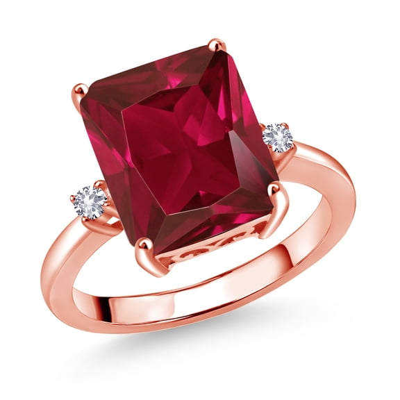 Gem Stone King 18K Rose Gold Plated Silver 12X10MM Red Created Ruby and 2MM White Created Sapphire 3 Stone Engagement Ring for Women | 5.78 Cttw | Gemstone July Birthstone | Size 7
